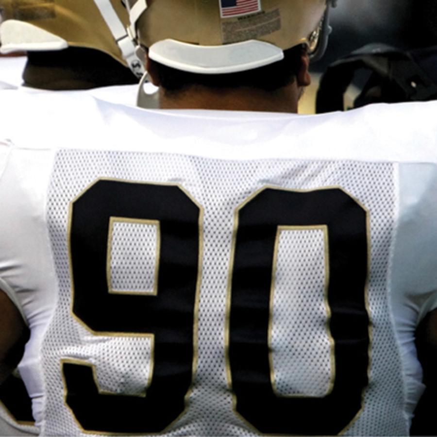 Mesh football jersey featuring custom cut twill appliqué numbers from Apex Transfers